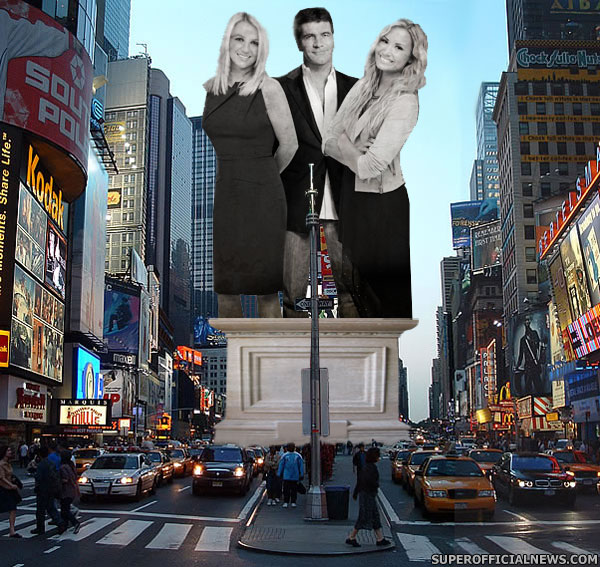 'The X Factor' 43-story tall marble statue was unveiled in Times Square today featuring the likenesses of Demi Lovato, Britney Spears and Simon Cowell... 